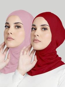 Detail of dark red and mauve full-cover hijab caps with high elasticity cotton fabric