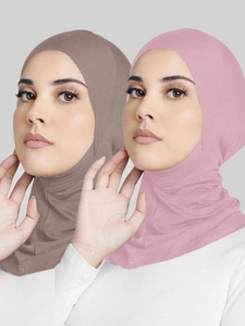 Detail view of two crossover mercerized cotton hijabs in brown-grey and light pink