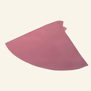 Detail of dusty pink hijab khimar showing fine plain weave texture and drape fabric