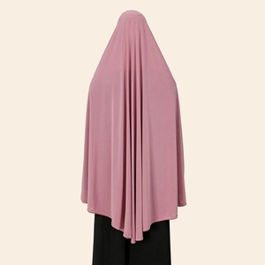 Back view of a dusty pink long Khimar hijab showing draped jersey fabric layers