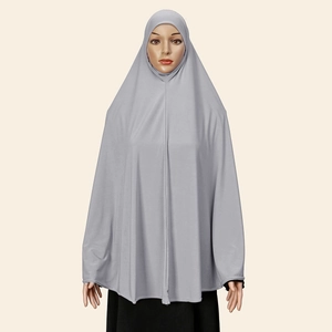 Detail of grey Muslim khimar hijab showing the high-stretch knitted fabric and drape