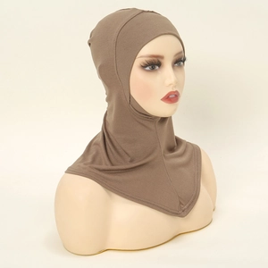 Detail of dark brown mercerized cotton hijab underscarf with neck coverage on mannequin