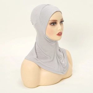 Detail view of light grey mercerized cotton hijab inner cap on a mannequin head