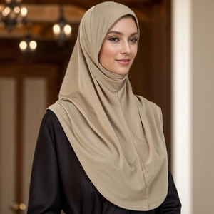 Detail of light khaki slip-on hijab in premium elastic fabric on an elegant model