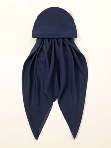 Close-up of dark blue ethnic style elastic headscarf with long twin tails for women