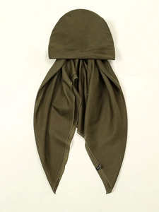 Detailed close-up of dark green ethnic style turban hat with premium stitching and texture
