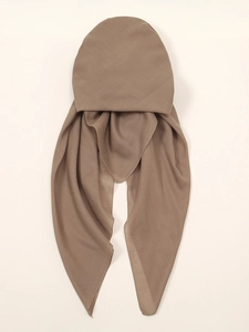 Close-up of brown chiffon turban hat featuring long double tails and soft breathable fabric