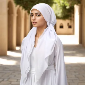 Detail of elegant white chiffon hijab and long sleeve abaya dress with side knot styling
