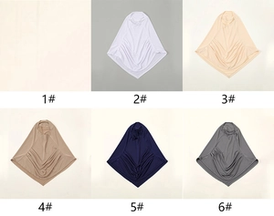 Collage of loose African turbans showing six different colors in soft elastic fabric