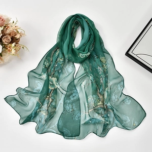Elegant dark green georgette silk scarf with floral patterns for summer sun protection