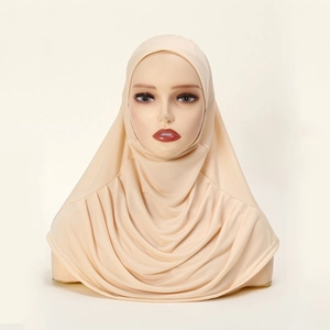 Detail view of beige slip-on hijab featuring draped folds and smooth stretch fabric