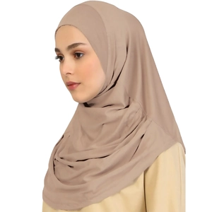 Detail of multi-layered khaki Muslim hijab featuring lightweight fabric with elegant drapes