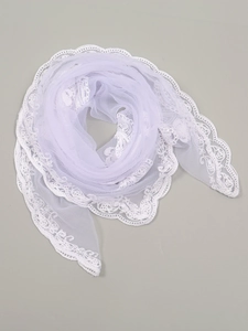 Close-up of light purple shawl featuring delicate floral lace embroidery and sheer fabric