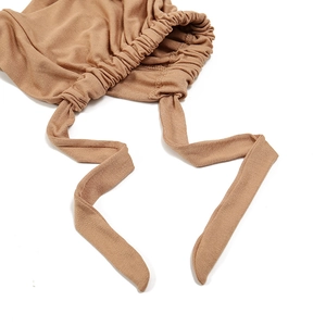 Close-up of brown modal stretch headwear featuring elastic gathers and tying straps