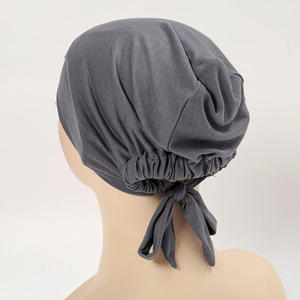 Detail of dark grey modal cotton stretch hijab cap featuring adjustable tie-back ribbons