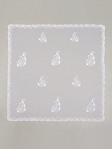 Macro shot of white lace floral embroidery on breathable semi-transparent hijab fabric