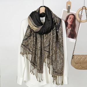 Ethnic paisley sunflower shawl with tassels and vintage floral embroidery on black fabric