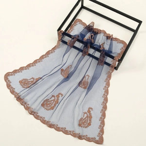 Elegant navy mesh hijab with paisley embroidery and detailed bronze lace trim