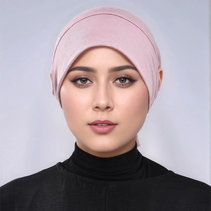 Close-up of pink modal inner hijab showing elastic band and smooth fabric texture