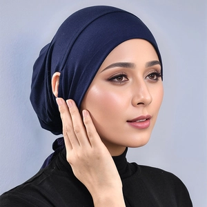 Close-up of navy modal hijab inner cap with adjustable straps and soft knit texture