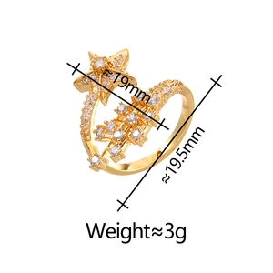 Sparkling star-shaped open ring with cubic zirconia stones in a gold finish