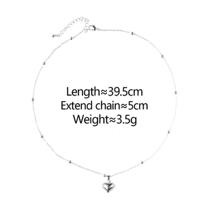 Detail view of heart pendant necklace showing 39.5cm length and 5cm extension chain