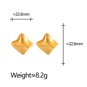 Matte gold irregular textured geometric stud earrings measuring 22.6mm by 22.6mm