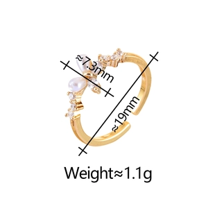 Elegant gold butterfly open ring featuring white pearl and cubic zirconia accents