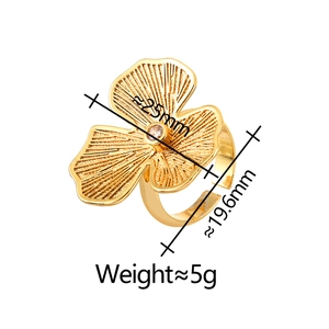 Golden textured flower open ring with central zircon and leaf design for women