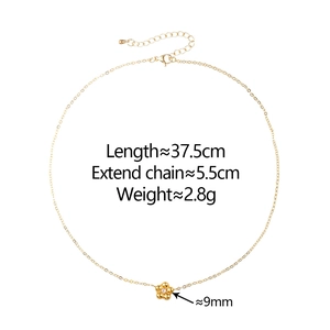 Detail of flower necklace showing 37.5cm chain length and 9mm small floral pendant