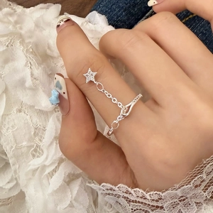 Sparkling zircon star pendant ring with connecting chain in elegant silver finish