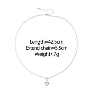 Detail view of heart pendant necklace with length specs and adjustable extension chain