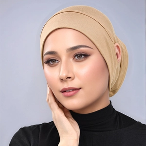 Detail of tan modal inner hijab cap featuring side openings for glasses and earphones