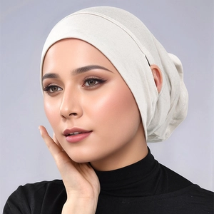 Macro detail of breathable off-white modal inner hijab cap with high elastic knit texture