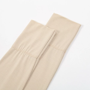 Detail of nude modal arm sleeves featuring flat seams and high elasticity edges