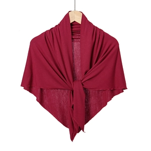 Detail of soft wine red mercerized cotton headscarf with fine knit texture and tie front