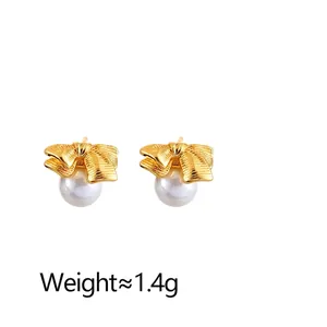 Elegant bow stud earrings with white shell pearl and gold-tone finish 10mm wide