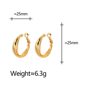 Minimalist golden geometric crossover hoop earrings with a matte textured finish 25mm