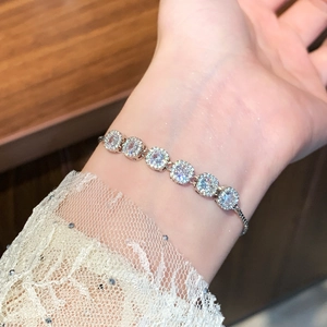 Sparkling zircon bracelet for women with silver-toned circular units and lace sleeve details