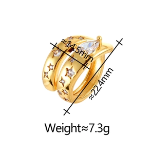Detail of vintage French style gold plated open ring with star patterns and pear cut zircon