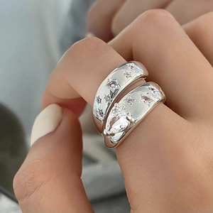 French vintage zircon ring set with star engraving and pear-cut gemstone in gold finish