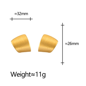 Exaggerated matte gold brushed metal stud earrings with fan shaped minimalist design