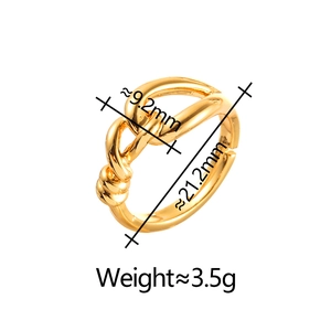 Detail view of gold knot ring showing 9.2mm width and 21.2mm diameter dimensions