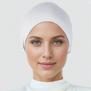 Classic white mercerized cotton hijab undercap providing a smooth, non-slip base