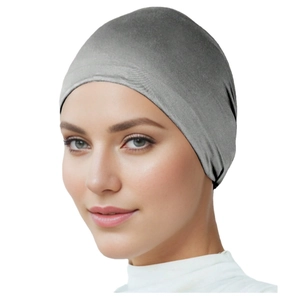 Solid dark grey mercerized cotton hijab undercap with tie-back design on model