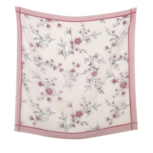 Detail eines französischen Seidenschals mit Blumenmuster und rosa Randverzierungen