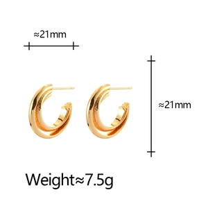Minimalist gold geometric C-shaped hoop earrings with a brushed metallic finish