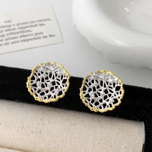 Luxury gold and silver hollow lace earrings with zircon studs for women on black velvet