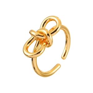 Bague ouverte dorée élégante en forme de nœud avec un design minimaliste et poli