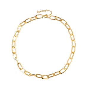 Detail of golden oval link chain necklace featuring a lobster clasp and extension